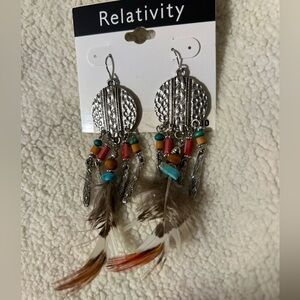 NWT rare vintage boho feather earrings with original packaging never worn